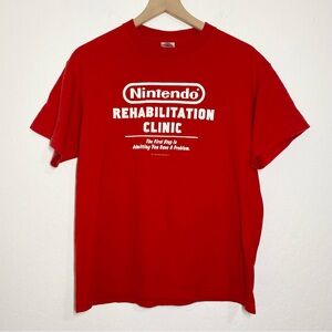 Delta Pro Weight Men’s M Vintage Nintendo Rehab Clinic Short Sleeve Shirt Casual